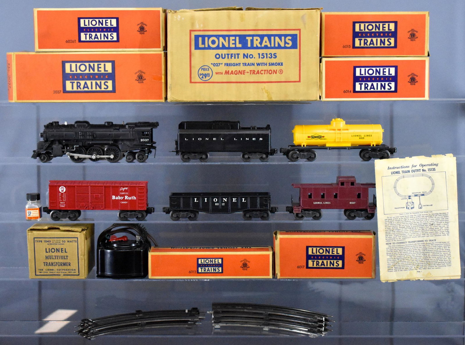 Boxed Lionel postwar O 1513S steam freight set: Boxed Lionel postwar O 1513S steam freight set to include 2037 steam locomotive, 6026T tender, 6014 Baby Ruth box car, 6015 tank car, 6012 gondola, 6017 caboose, track and 1043 transformer, C7+ trains