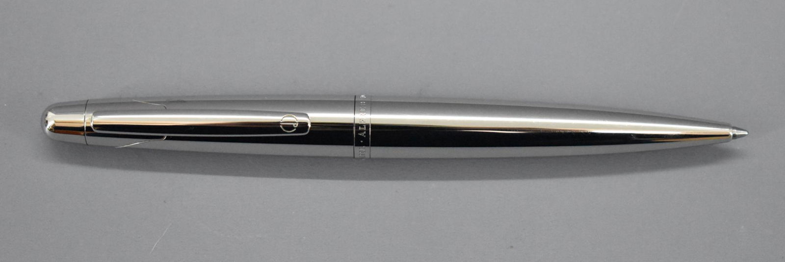 Dunhill ballpoint pen: Dunhill ballpoint pen. Measures 5 1/2 inches in length with the cap screwed on. This pen has been used at some point and may or may not be missing internal parts as we do not have any knowledge o