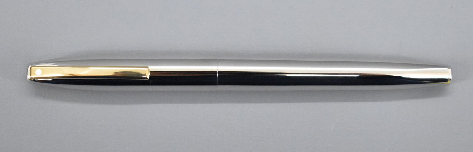 Sheaffer Imperial fountain pen: Sheaffer Imperial fountain pen. Gold-electroplated Inlaid nib. Measures 5 1/2 inches in length with the cap slipped on. This pen has been used at some point and may or may not be missing internal