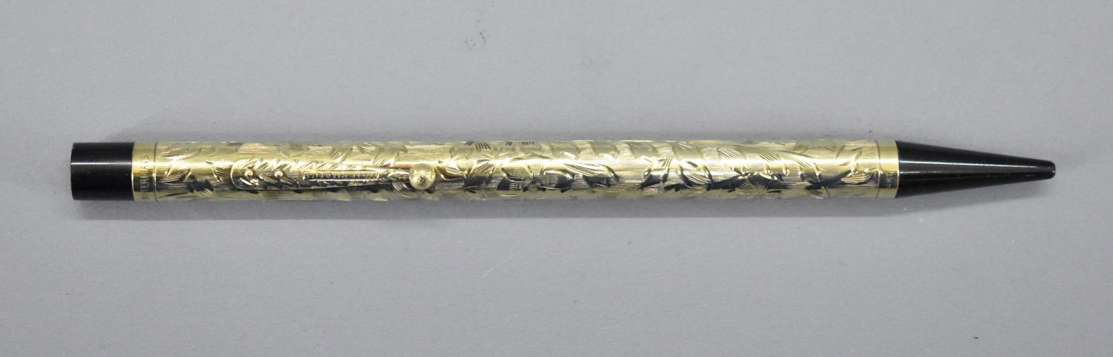Waterman Pencil, 1920s, Solid 14k Gold sleeve: Waterman Pencil, 1920s, Solid 14k Gold sleeve. Measures 5 1/4 inches in length with the cap screwed on. This pencil has been used at some point and may or may not be missing internal parts as we 
