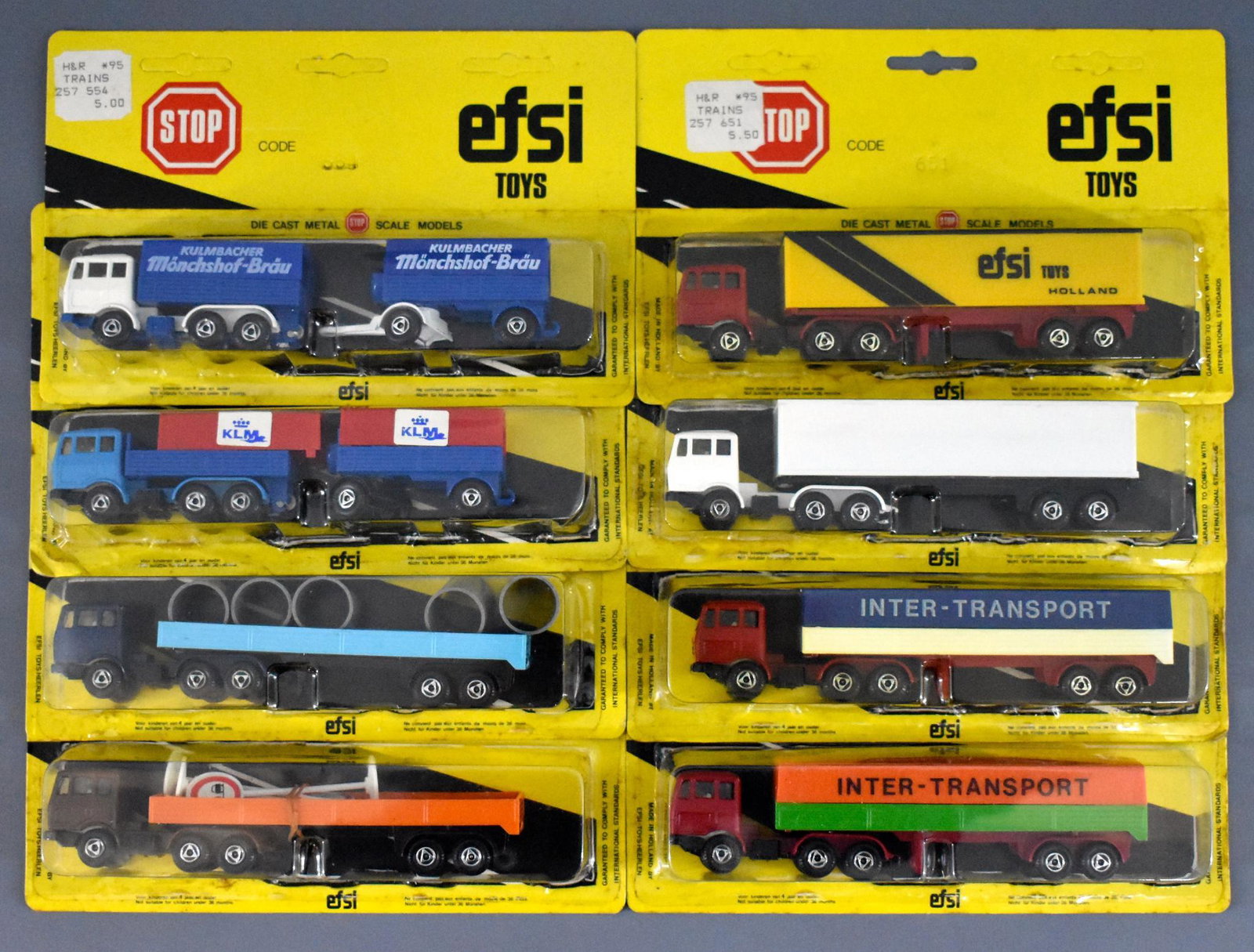 Group of eight EFSI 1/87 scale die cast semi tractors: Group of eight EFSI 1/87 scale die cast semi tractors on sealed blister cards, all near mint to mint on sealed cards.