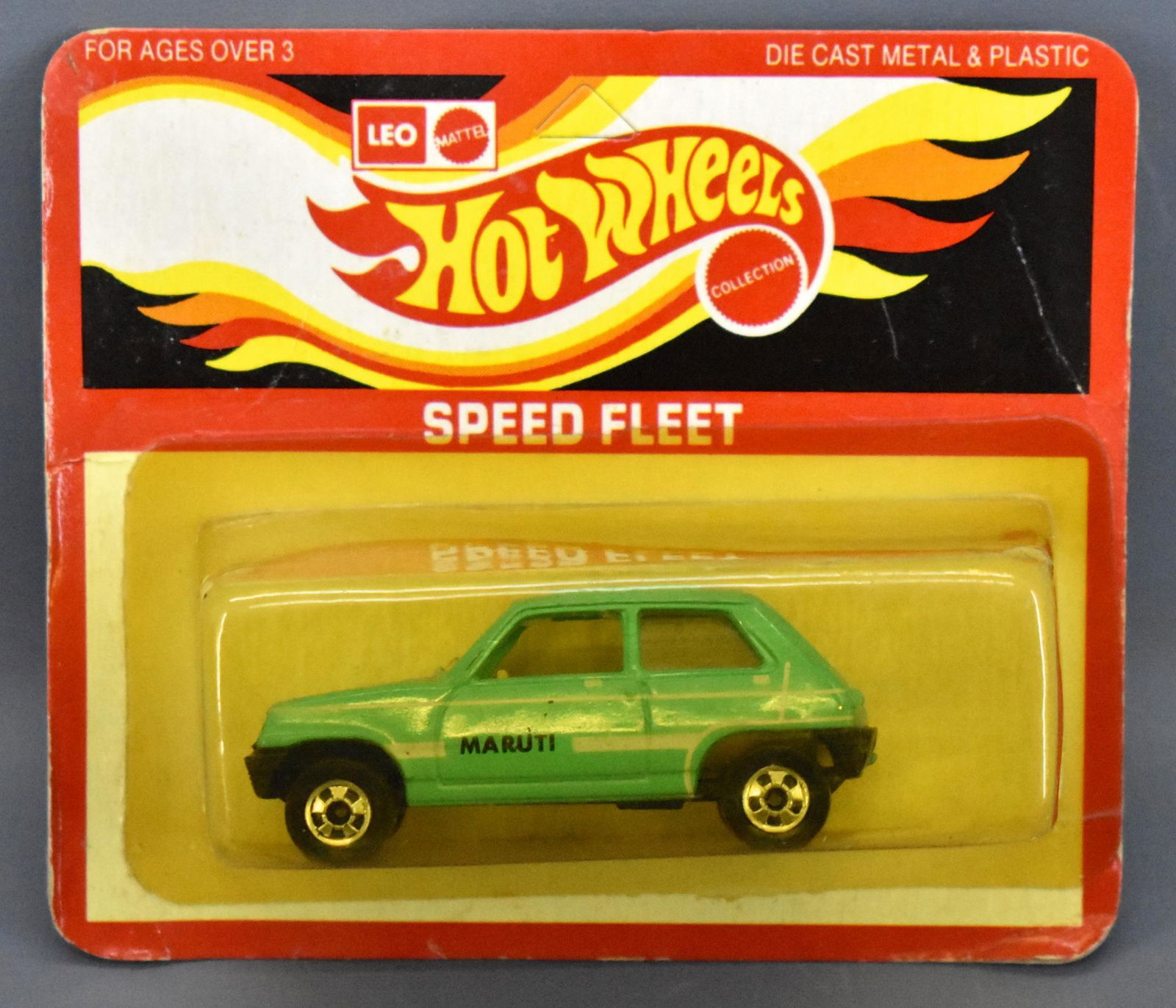 India Leo Hot Wheels Speed Fleet teal Maruti on blister: India Leo Hot Wheels Speed Fleet teal Maruti on blister card, card is unpunched and the blister is yellowed as seen in the photos.
