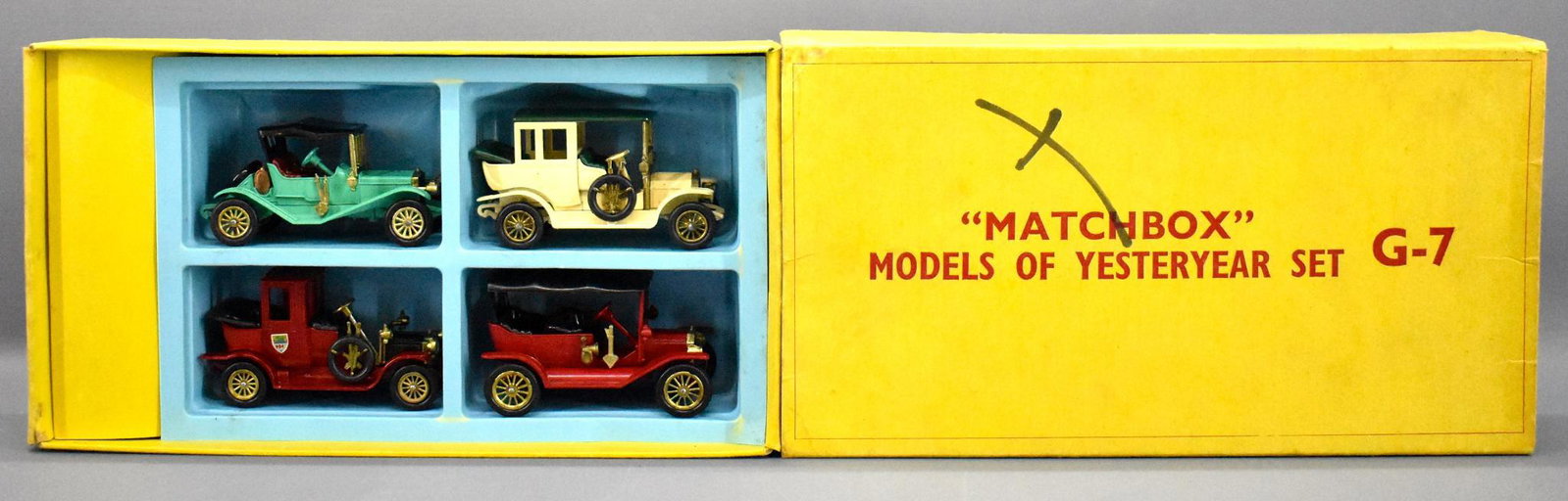 Vintage Matchbox MOY G-7 gift set in mismatched box: Vintage Matchbox MOY G-7 gift set in mismatched box with G-2 bottom. Includes four near mint to mint cars in a G-2 base with a correct G-7 sleeve that does have an "X" in marker on the top.