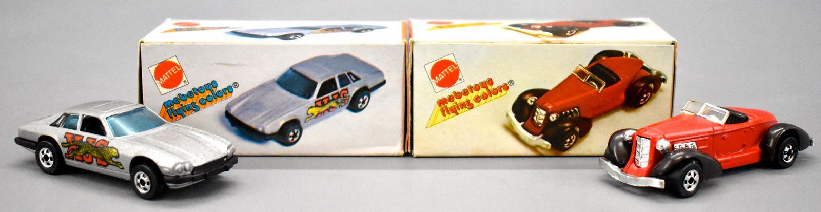 Pair of Hot Wheels Mebetoys die cast cars in original: Pair of Hot Wheels Mebetoys die cast cars in original boxes to include 2505 Auburn 852 and 2012 Jaguar XJ, both near mint to mint in excellent original boxes.