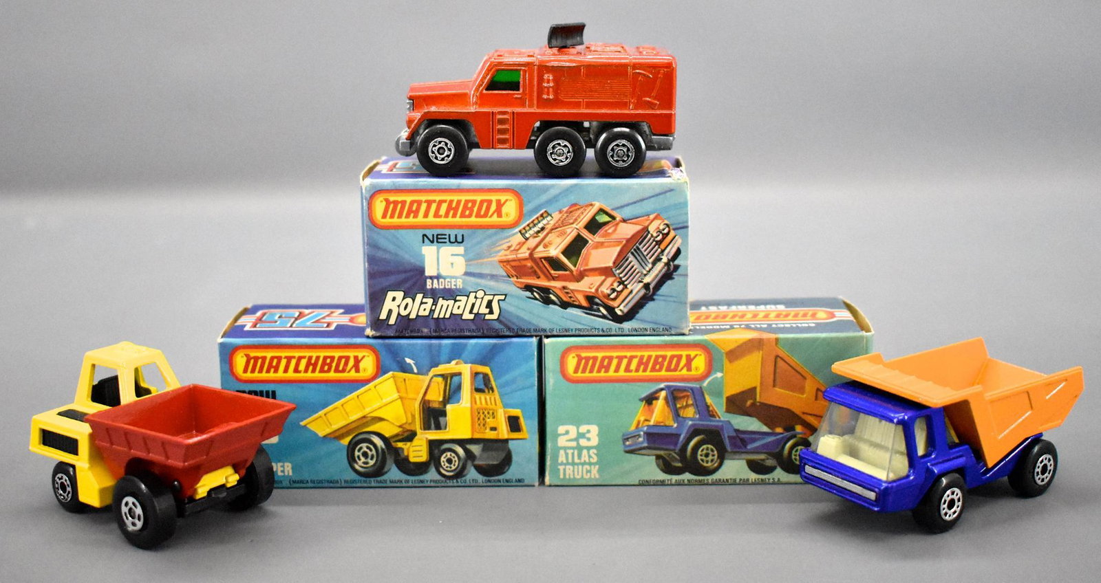 Three Matchbox Superfast die cast in original boxes: Three Matchbox Superfast die cast in original boxes to include Rolamatics 16 badger with a tiny paint chip on the hood plus 23 Atlas Truck and 26 Site Dumper that are near mint. Comes with three very 