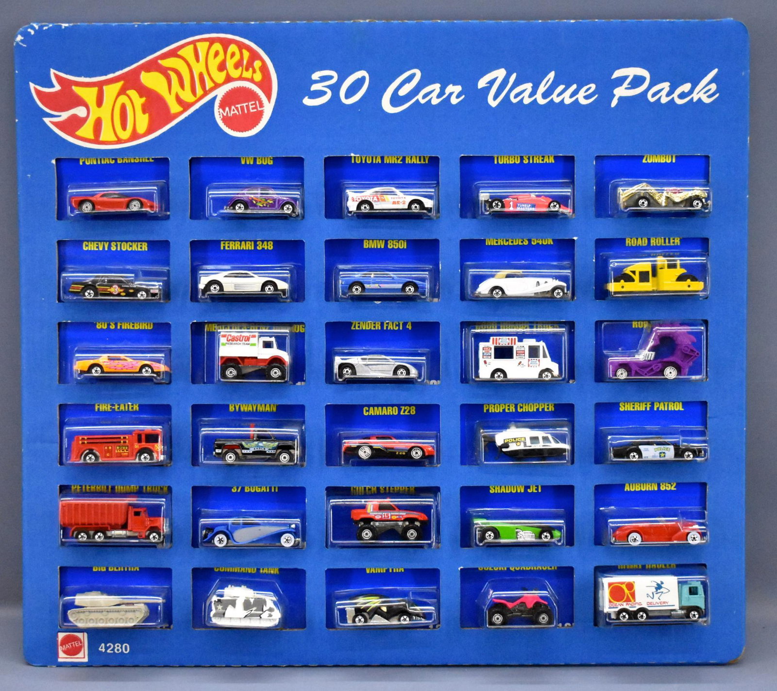 Scarce 1990's Hot Wheels Blue cars 30 car value pack on: Scarce 1990's Hot Wheels Blue cars 30 car value pack on blister cards, all 30 cars are near mint to mint on very good to near mint blister cards with clean and clear blisters.
