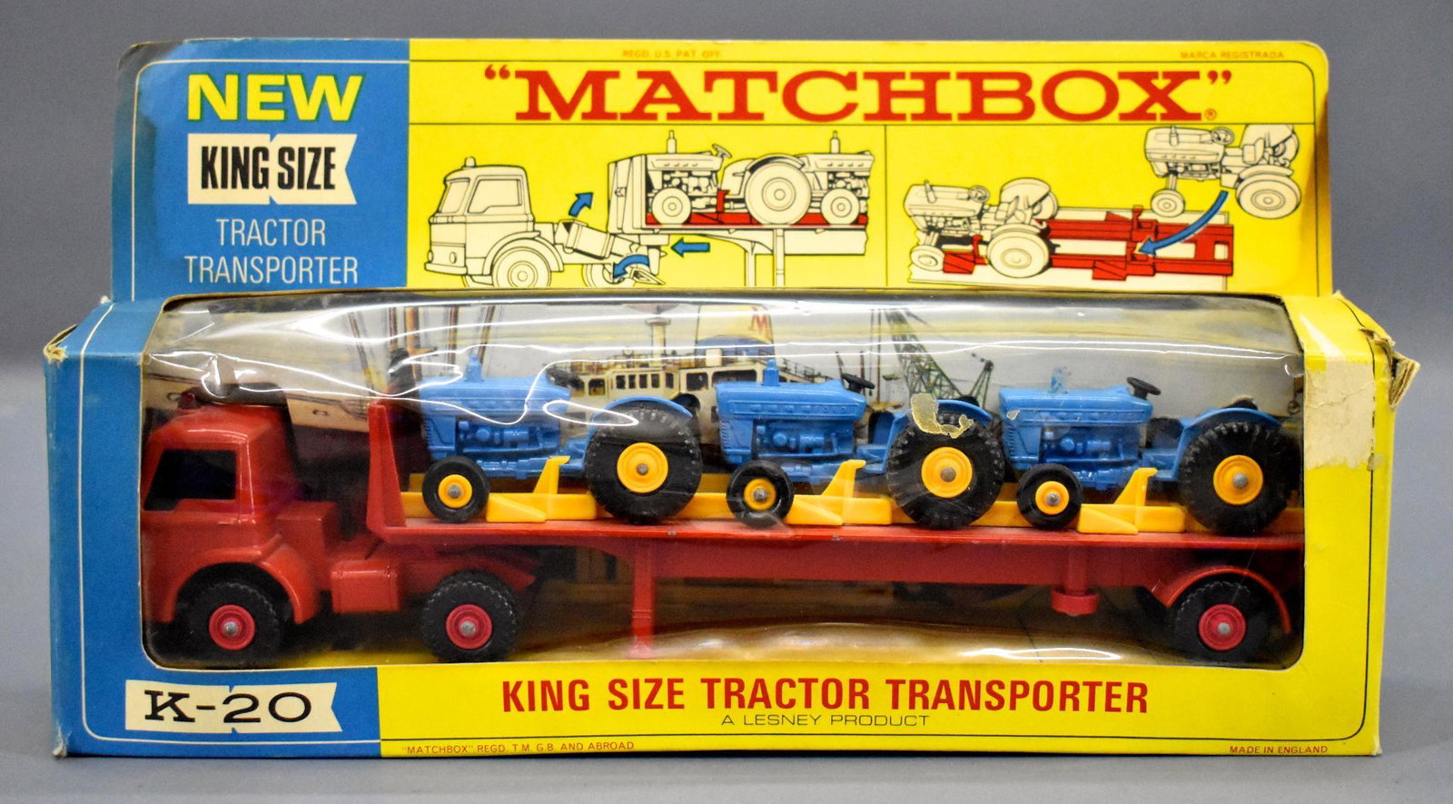 Vintage Matchbox King Size K-20 tractor transporter die: Vintage Matchbox King Size K-20 tractor transporter die cast in original box, near mint condition in a good original box with some water stains and minor surface skinning as seen in the photos.