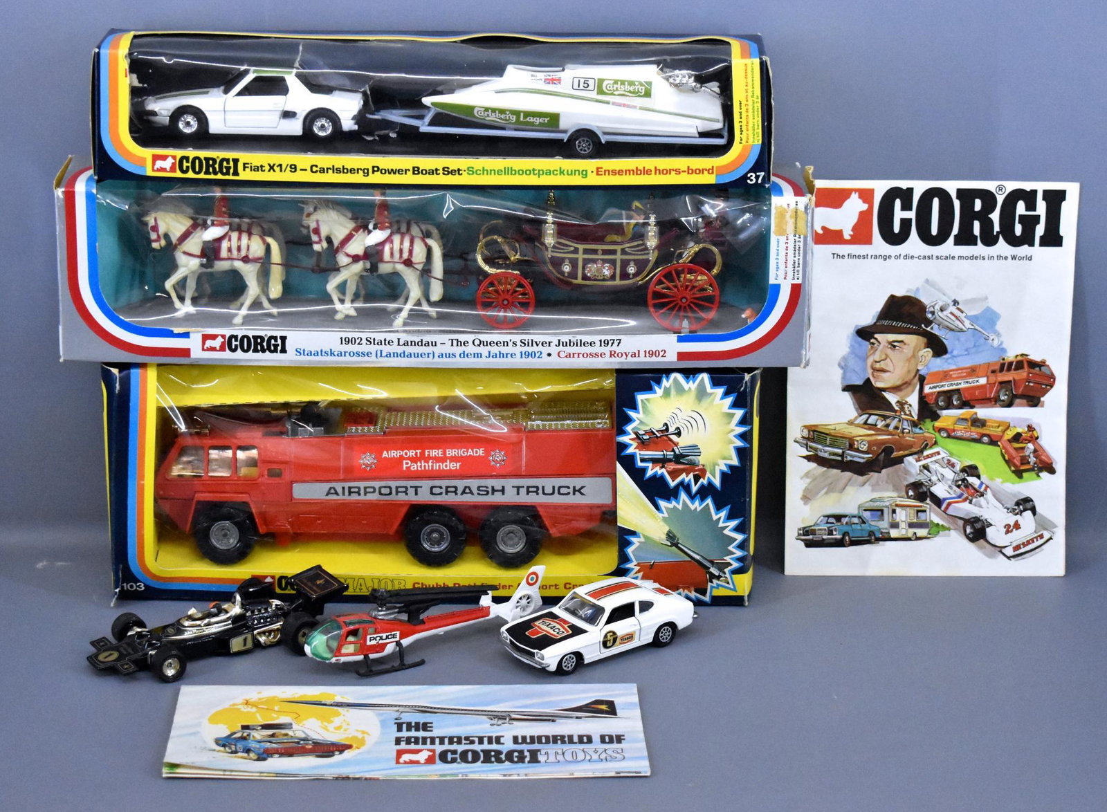 Nice group of 1970's Corgi die cast toys in original: Nice group of 1970's Corgi die cast toys in original boxes and loose to include boxed 37 Fiat X1/9-Carlsberg power boat set, 1103 Chubb pathfinder airport crash truck and 41 1902 State Landau for 1977