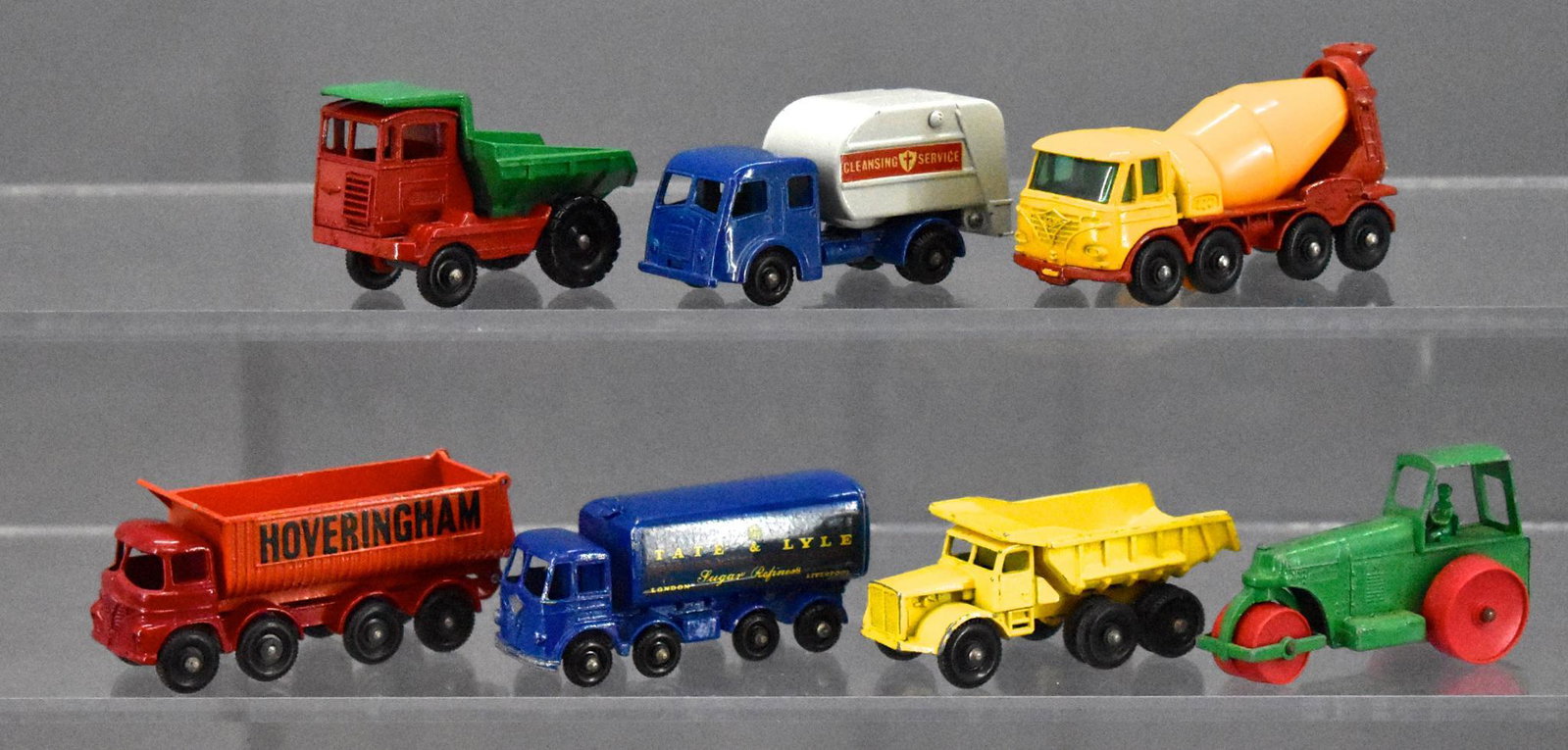 Group of seven vintage Matchbox regular wheels die cast: Group of seven vintage Matchbox regular wheels die cast trucks and road roller, all in nice shape varying from very good plus to excellent plus as seen in the photos.