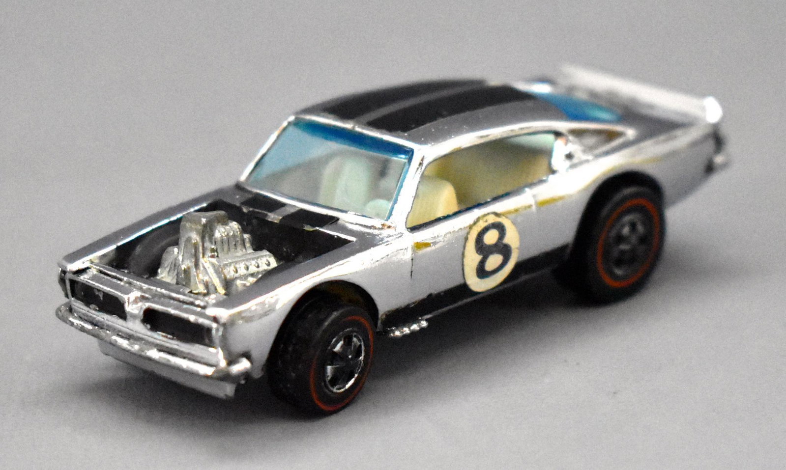 Redline Hot Wheels chrome HK King Kuda: Redline Hot Wheels chrome HK King Kuda, very clean and shiny with a very shiny base but does have some wear to the roof stripes as seen in the photos.
