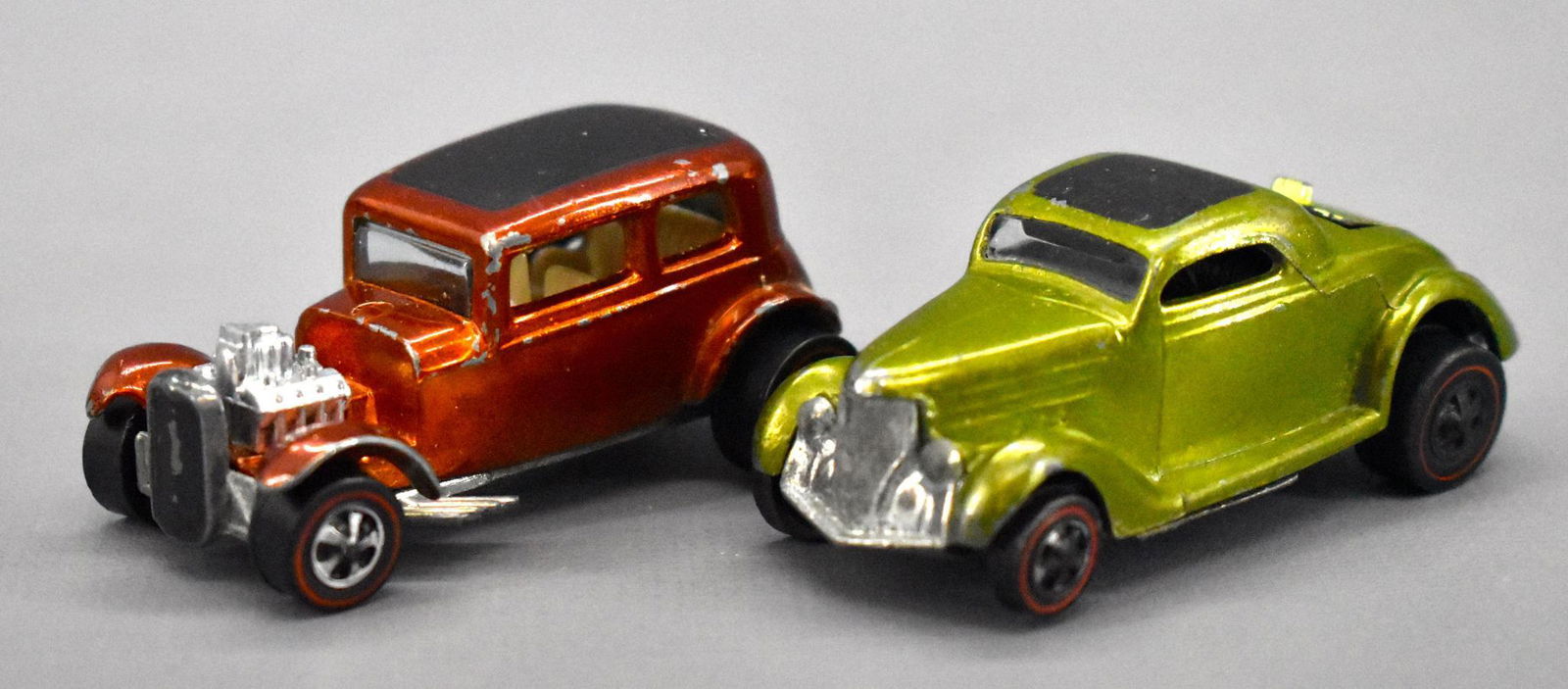 Two Redline Hot Wheels cars Classic '36 Ford coupe: Two Redline Hot Wheels cars to include a toned olive Classic '36 Ford coupe and an orange Classic '32 Ford Vicky with some paint chips. Sold as-is as seen in the photos with no returns.