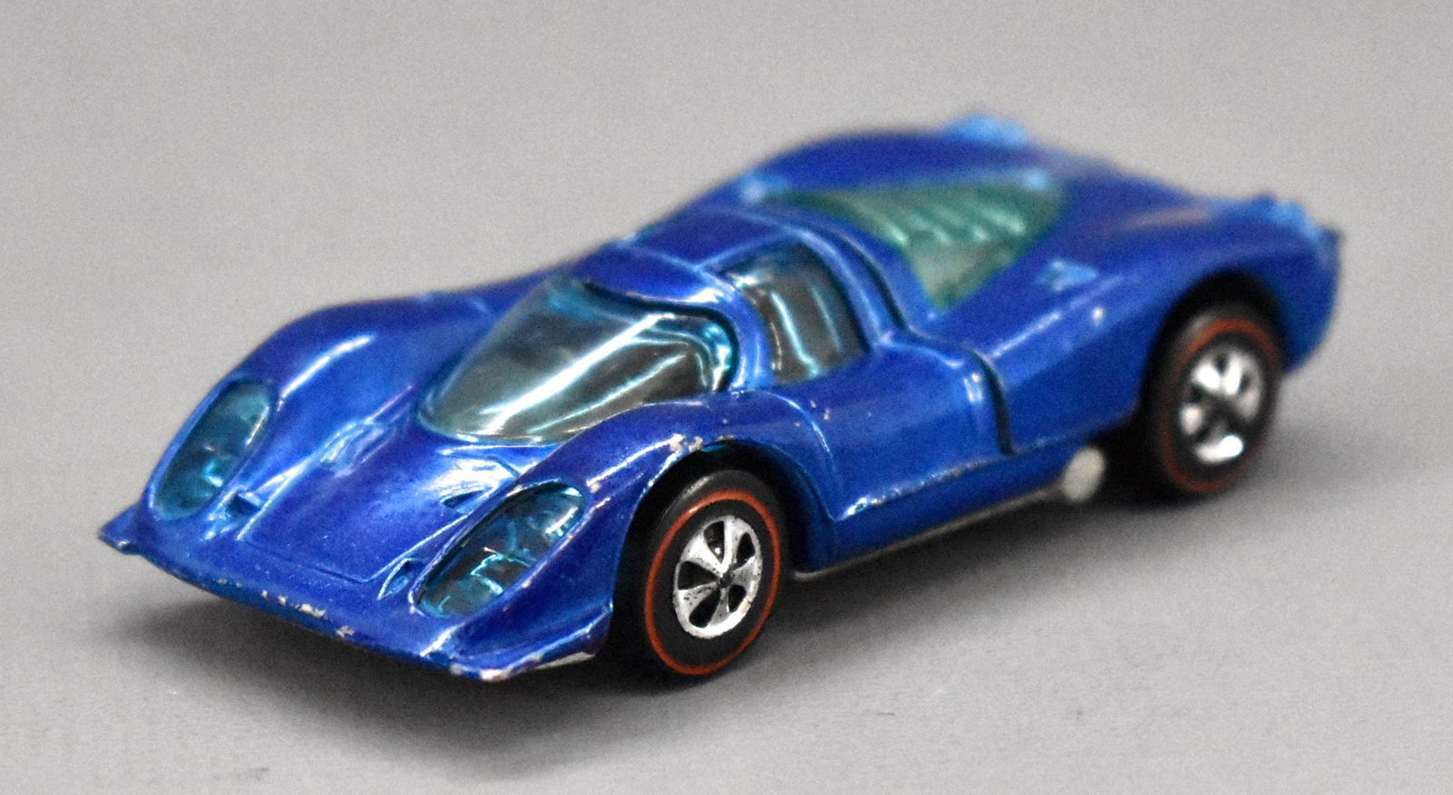 Redline Hot Wheels blue HK Porsche 917: Redline Hot Wheels blue HK Porsche 917, very clean but has some micro-wear here and there with shiny gunmetal base as seen in the photos.