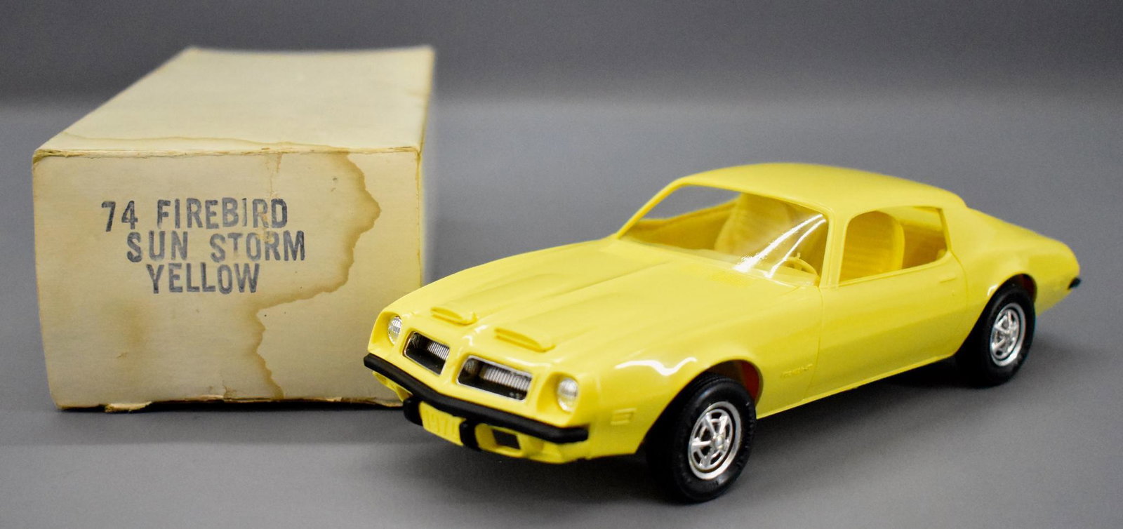 1974 Pontiac Firebird dealer promo car in original box: 1974 Pontiac Firebird dealer promo car in original box sun storm yellow, very nice and clean with some very light box rubs on the roof but nothing major, excellent to near mint condition as seen in th