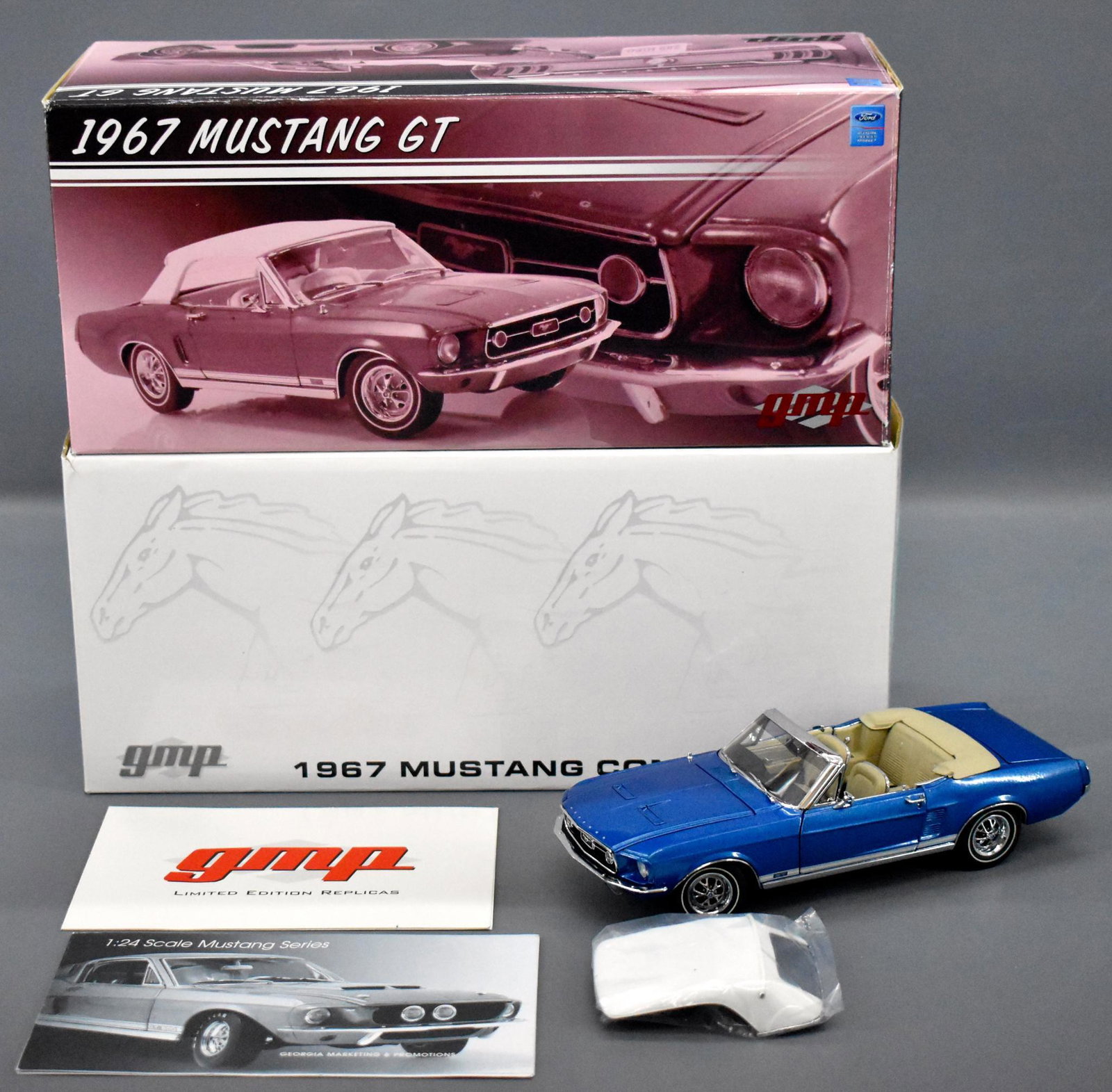 GMP Limited Edition 1967 Ford Mustang convertible die: GMP Limited Edition 1967 Ford Mustang convertible die cast in original box, 1 of 500 made, looks nice but the drivers side door is broken and will just fall out if it is attempted to open, comes in a 