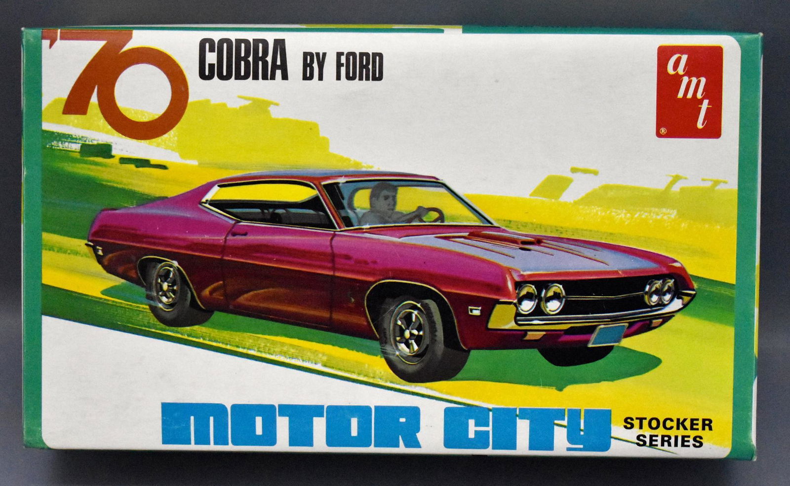 Mint unbuilt AMT 1970 Motor City Ford Cobra 1/25 scale: Mint unbuilt AMT 1970 Motor City Ford Cobra 1/25 scale model kit in original box, complete and unbuilt in a near mint original box as seen in the photos.