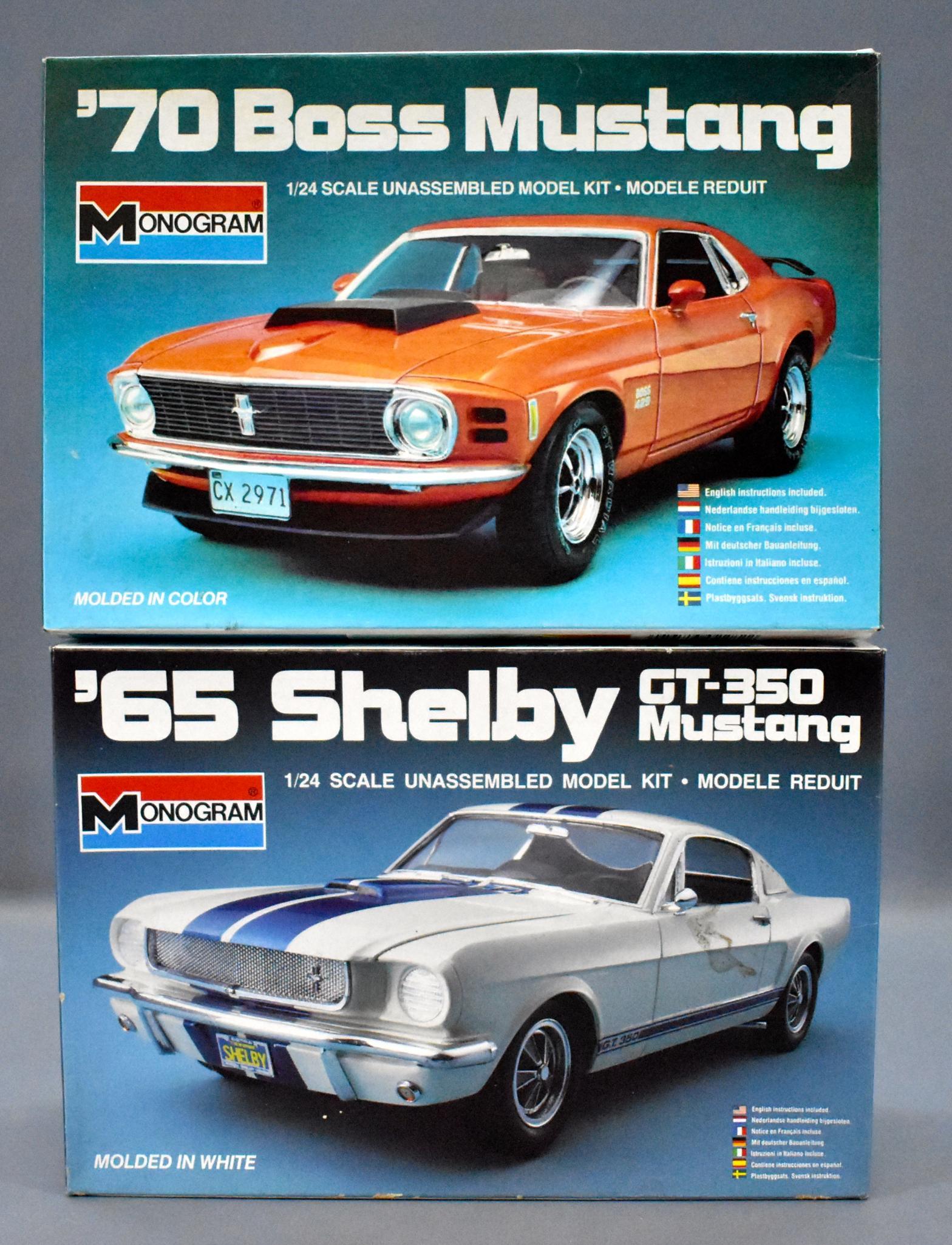 Two Mint unbuilt Monogram Ford Mustang 1/24 scale model: Two Mint unbuilt Monogram Ford Mustang 1/24 scale model kits in original boxes to include 2282 '70 Boss and 2700 '65 Shelby GT-350. Both are open box, sealed bag kits with crisp original instruction s