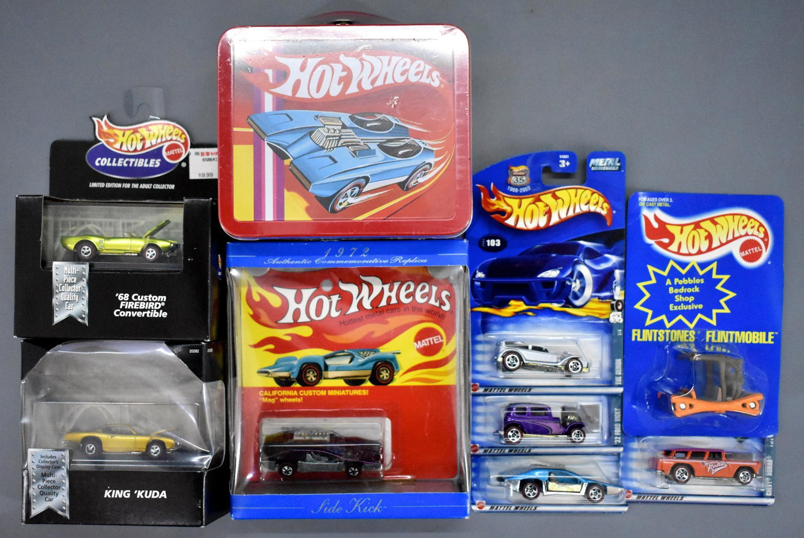 Group of modern Hot Wheels collectibles with cars and: Group of modern Hot Wheels collectibles with six cars on blister cards, two in individual boxes and a mini lunch box, all mint with excellent to near mint packaging.