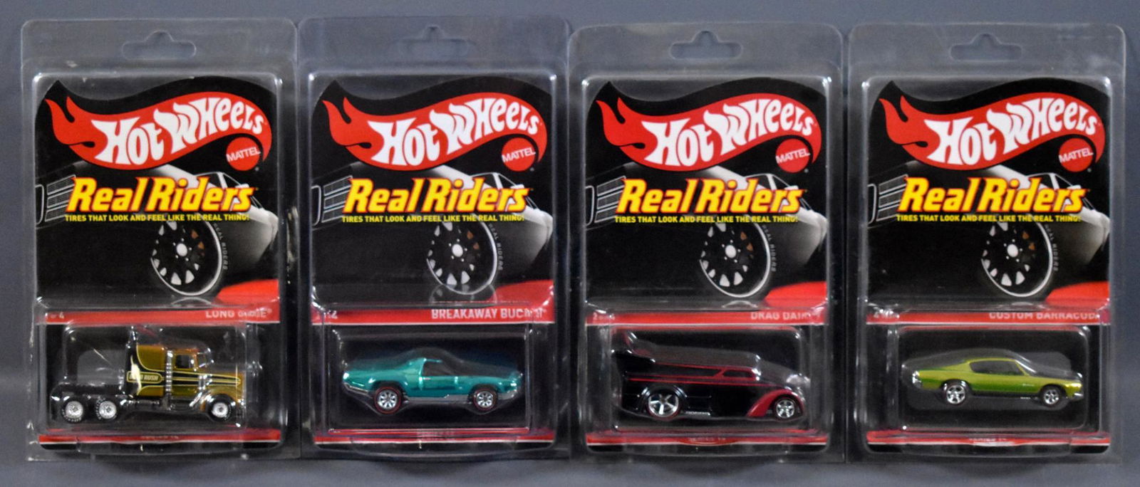 Four Mattel Hot Wheels Real Riders Redline Club cars: Four Mattel Hot Wheels Real Riders Redline Club cars to include Long Gone, Breakaway Bucket, Drag dairy and Custom Barracuda, all mint on sealed blister cards with protecto packs.