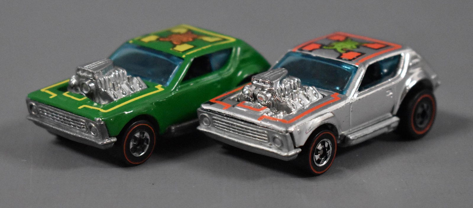 Two Original Redline Hot Wheels Gremlin Grinder: Two Original Redline Hot Wheels Gremlin Grinder to include one green and one chrome, both have play wear as seen in the photos.