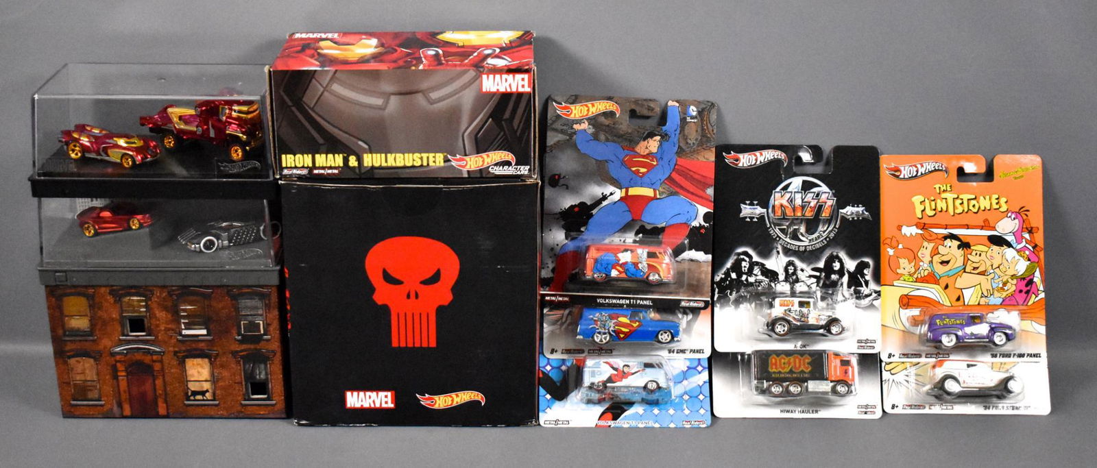 Group of Hot Wheels Real Riders and Marvel character: Group of Hot Wheels Real Riders and Marvel character die cast cars to include The Wasp, two Superman, Flintstones, Hong Kong Phooey, Iron Man & Hulkbuster, Daredevil vs Punisher, AC-DC and KISS cars,