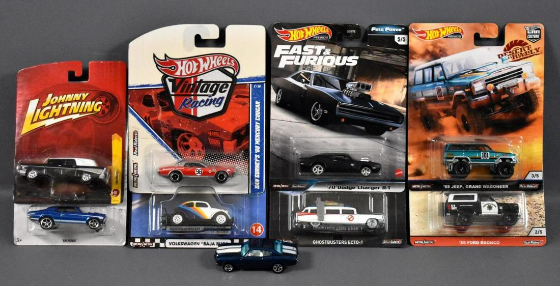 Neat group of modern era die cast cars on blister cards: Neat group of modern era die cast cars on blister cards to include one Playing Mantis Johnny Lightning and the rest are Hot Wheels including one loose1970 Chevelle as seen in the photos.