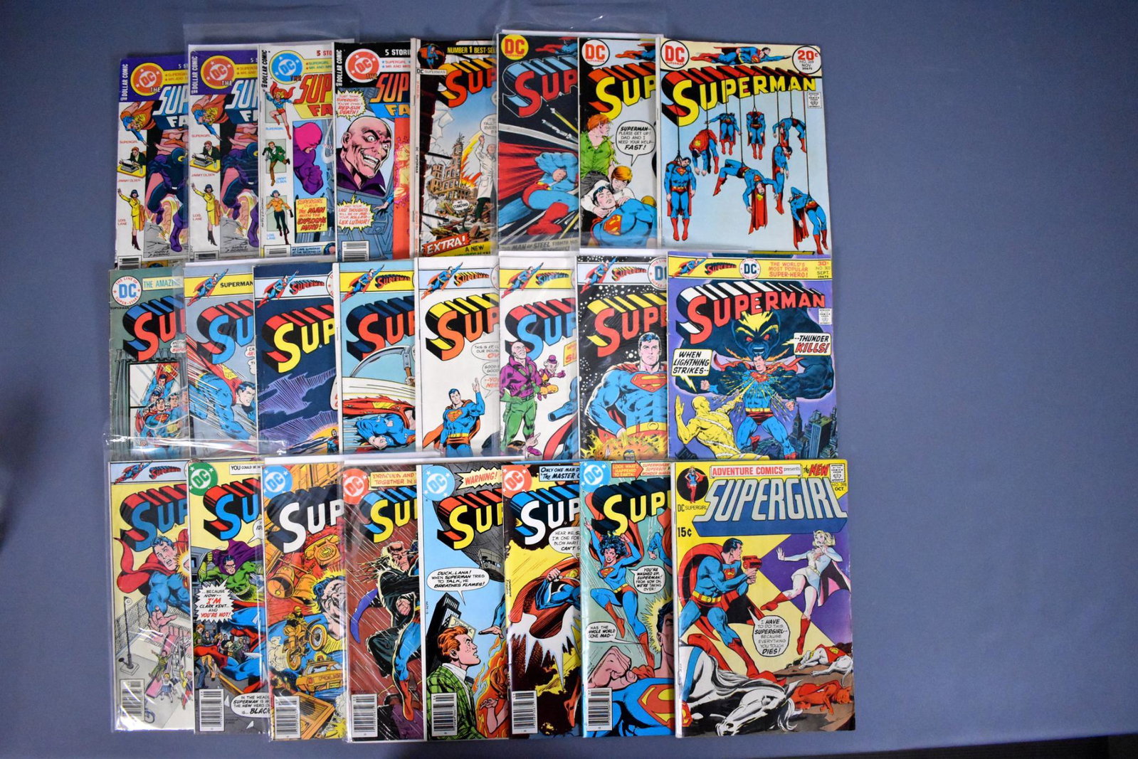 Twenty-four 1970's era DC Superman related comic books: Twenty-four 1970's era DC Superman related comic books ranging from good to very fine condition.