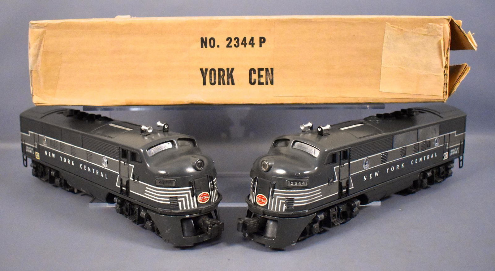 Lionel postwar O 2344 New York Central F3 AA diesel: Lionel postwar O 2344 New York Central F3 AA diesel locomotive set with one original box, C6-7, no battery damage and no screw cracks. The original box has graffiti as seen in the photos and no insert