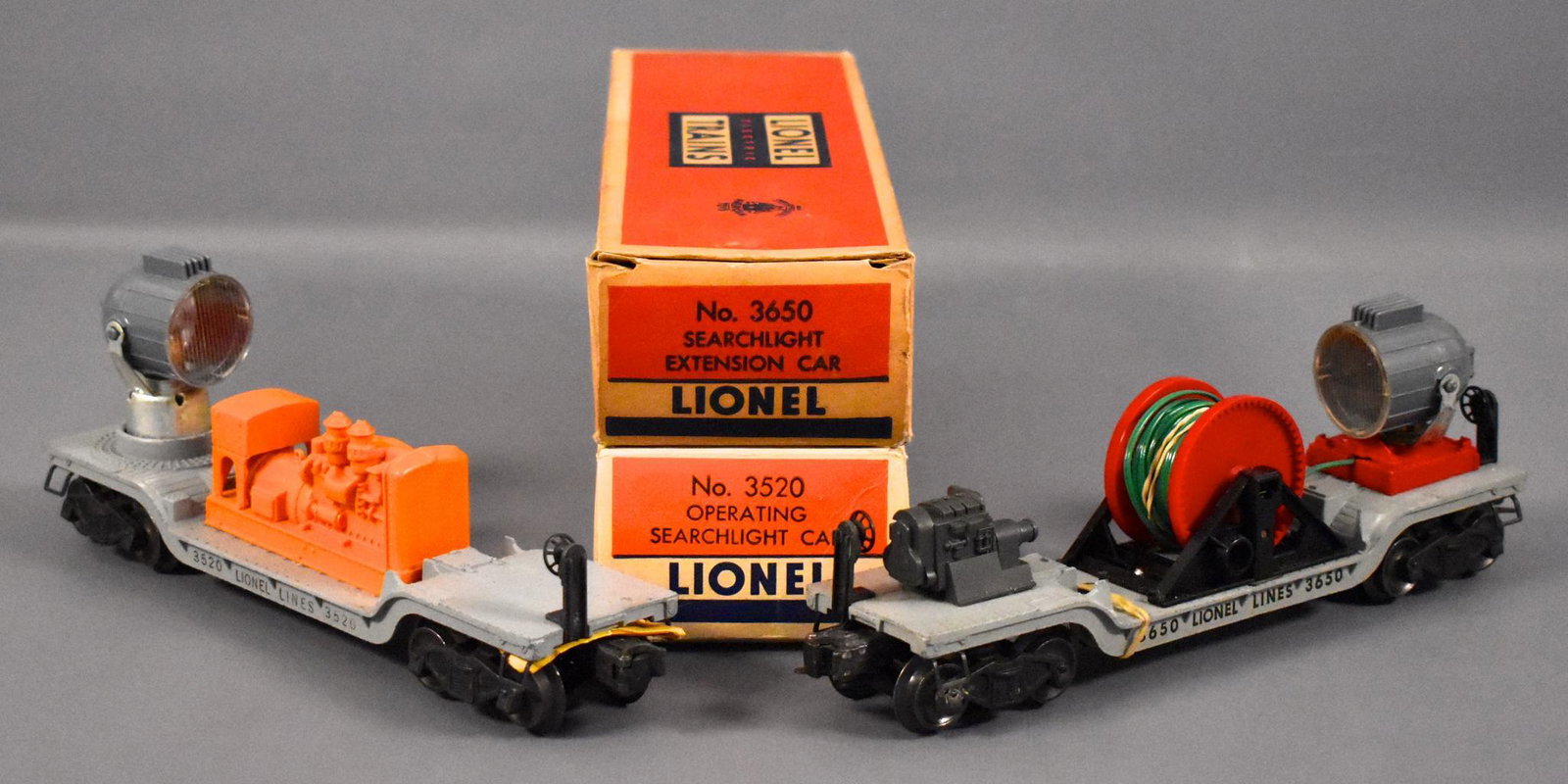 Lionel postwar O 3520 3650 searchlight cars in original: Lionel postwar O 3520 and 3650 searchlight cars in original boxes, both with very light run time and C6-7 with very good original boxes.