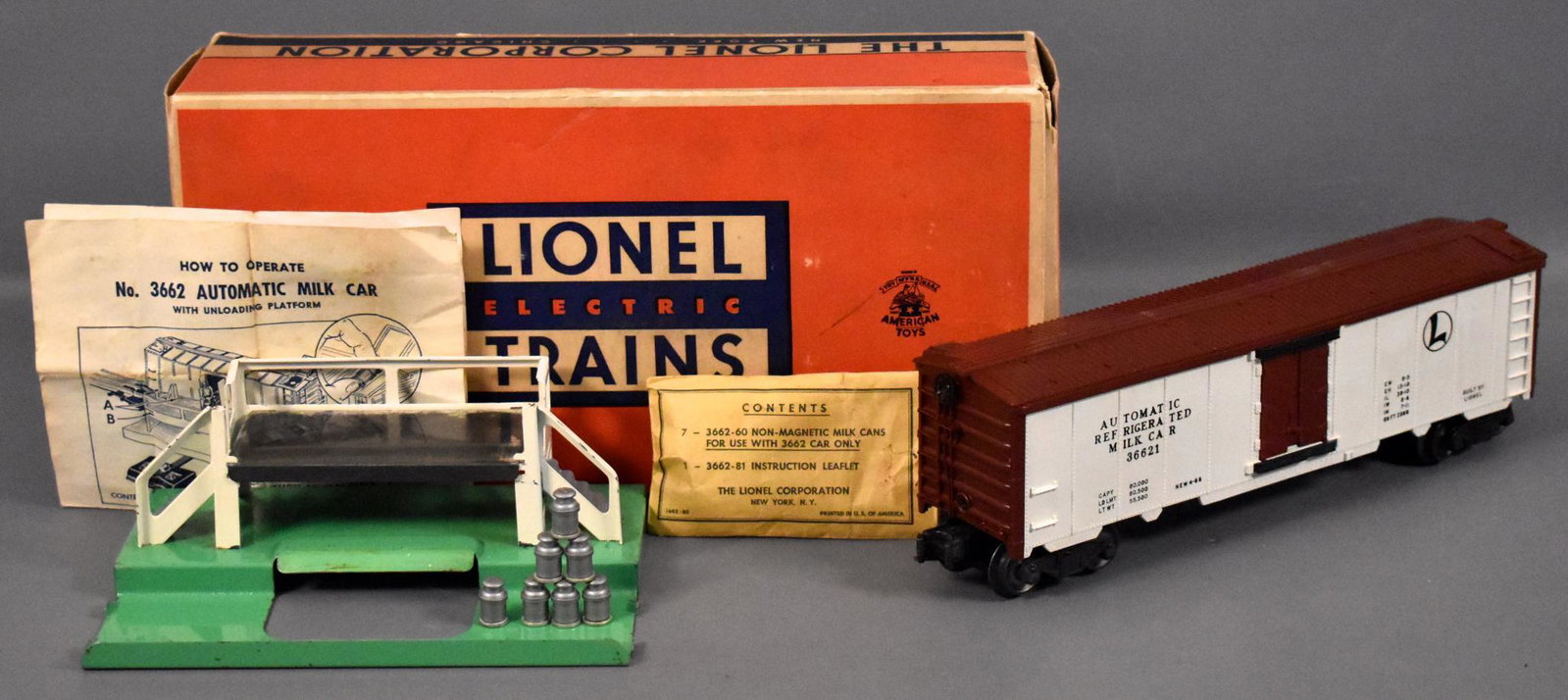 Lionel postwar O 3662 operating milk car set in: Lionel postwar O 3662 operating milk car set in original box, car is C7+, platform is C6, comes with packet, seven milk cans and original instruction sheet in an excellent original box with origin