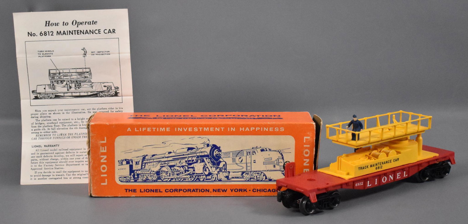 Scarce Lionel postwar O DARK YELLOW 6812 track: Scarce Lionel postwar O DARK YELLOW 6812 track maintenance car in original box, car shows light run time and is C7-8 with no damaged or repaired railings in a good original box with a missing inner fl