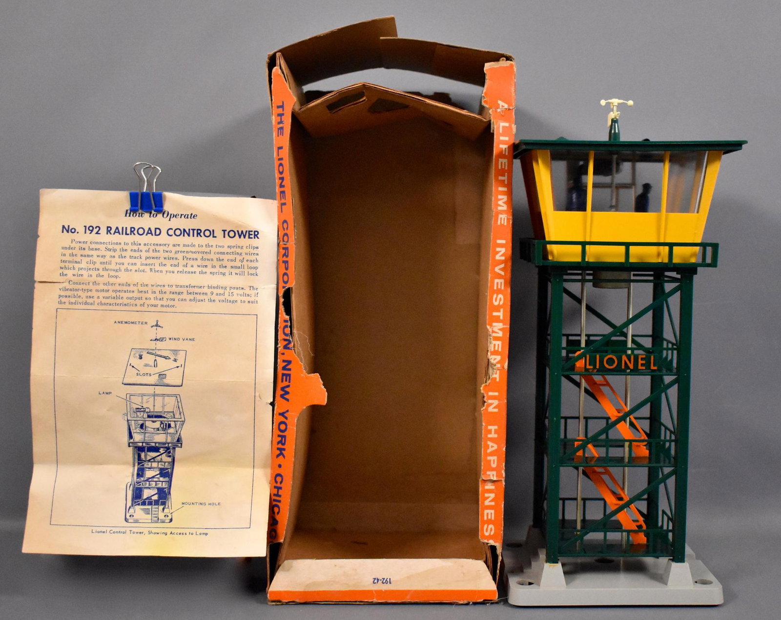 Lionel postwar O 192 Railroad Control Tower in original: Lionel postwar O 192 Railroad Control Tower in original box, C7+ accessory in a poor original box with a crisp original instruction sheet.