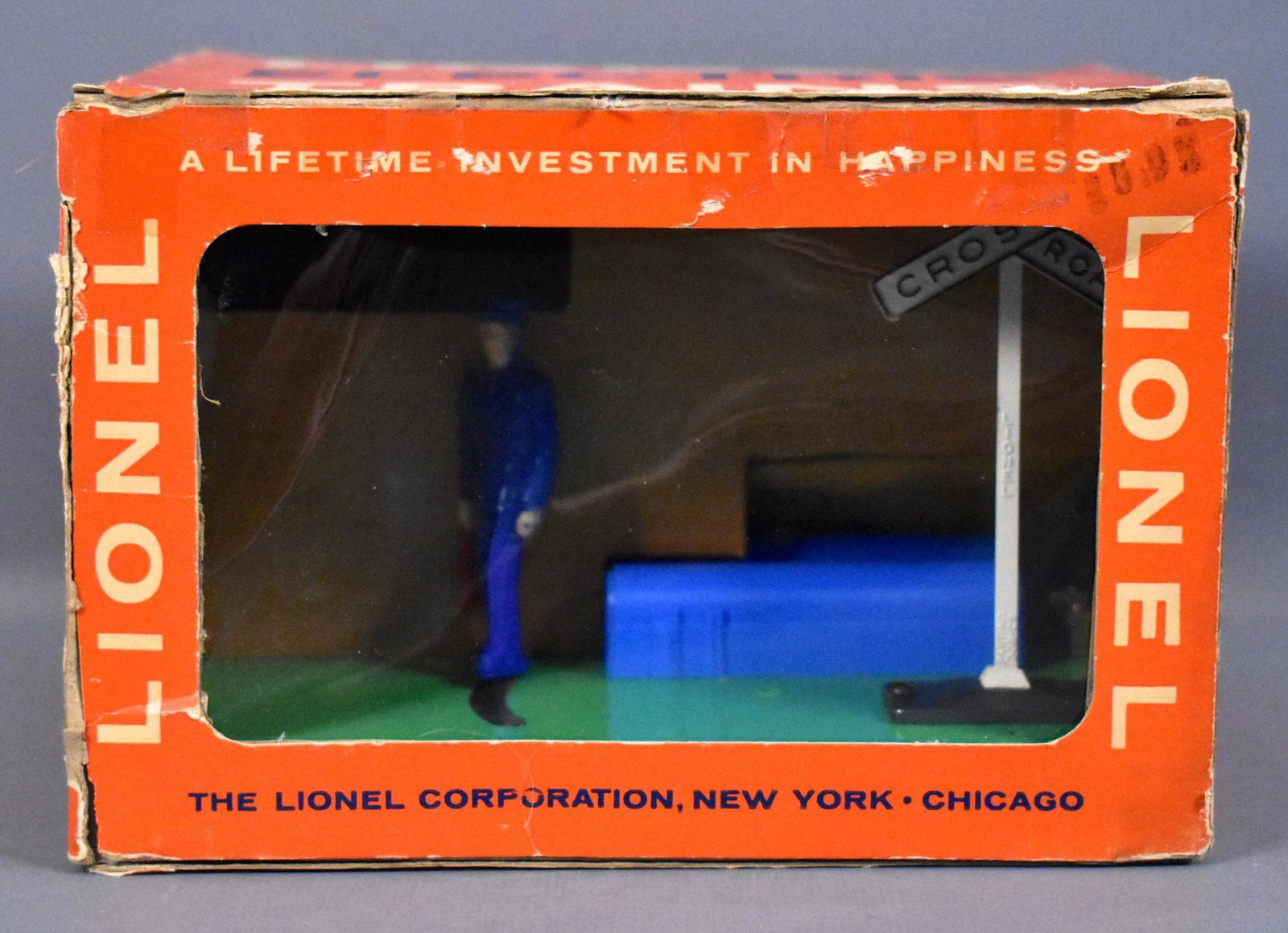 Mint Lionel postwar O 1047 Switchman with Flag in: Mint Lionel postwar O 1047 Switchman with Flag in original box, C9-10 accessory with a sealed parts packet in a fair to good cellophane window box.