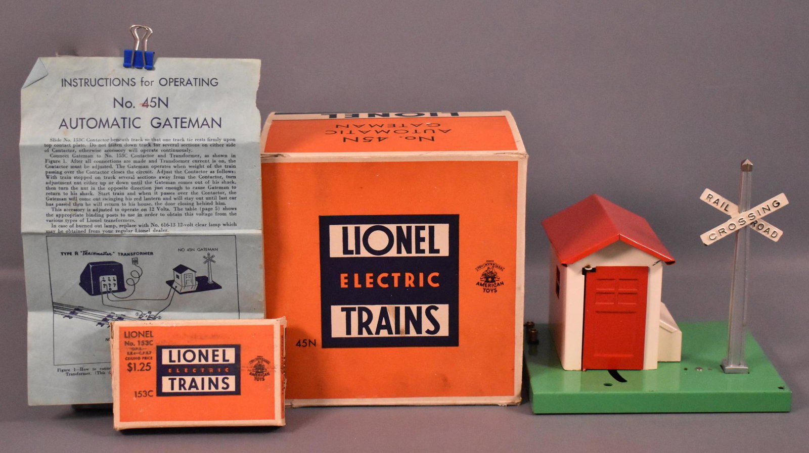 Minty Lionel postwar O 45N automatic gateman in: Minty Lionel postwar O 45N automatic gateman in original box, C9+ in an excellent original box with original insert and a separate sale 153C contactor instead of a parts packet in original box ins
