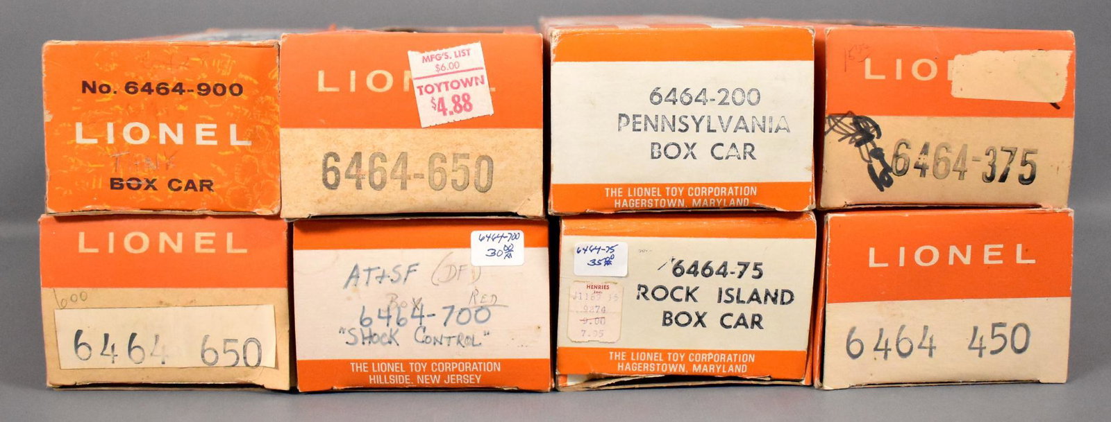 Group of eight Lionel postwar 6464 box car empty: Group of eight Lionel postwar 6464 box car empty original boxes to include a customized Hillside checkerboard, -75 Rock Island and -200 Hagerstown checkerboard, -375 Central of Georgia, -450 Great Nor
