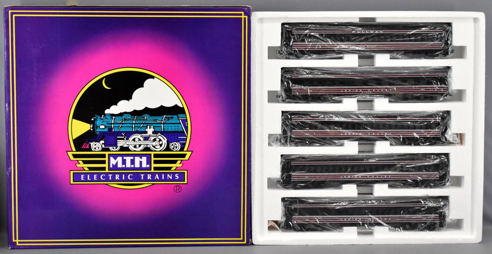 MTH MT-4010 Lehigh Valley John Wilkes scale Madison: MTH MT-4010 Lehigh Valley John Wilkes scale Madison passenger car set in original box, cars show little to no run time and are C9 in a very good original box with original insert.