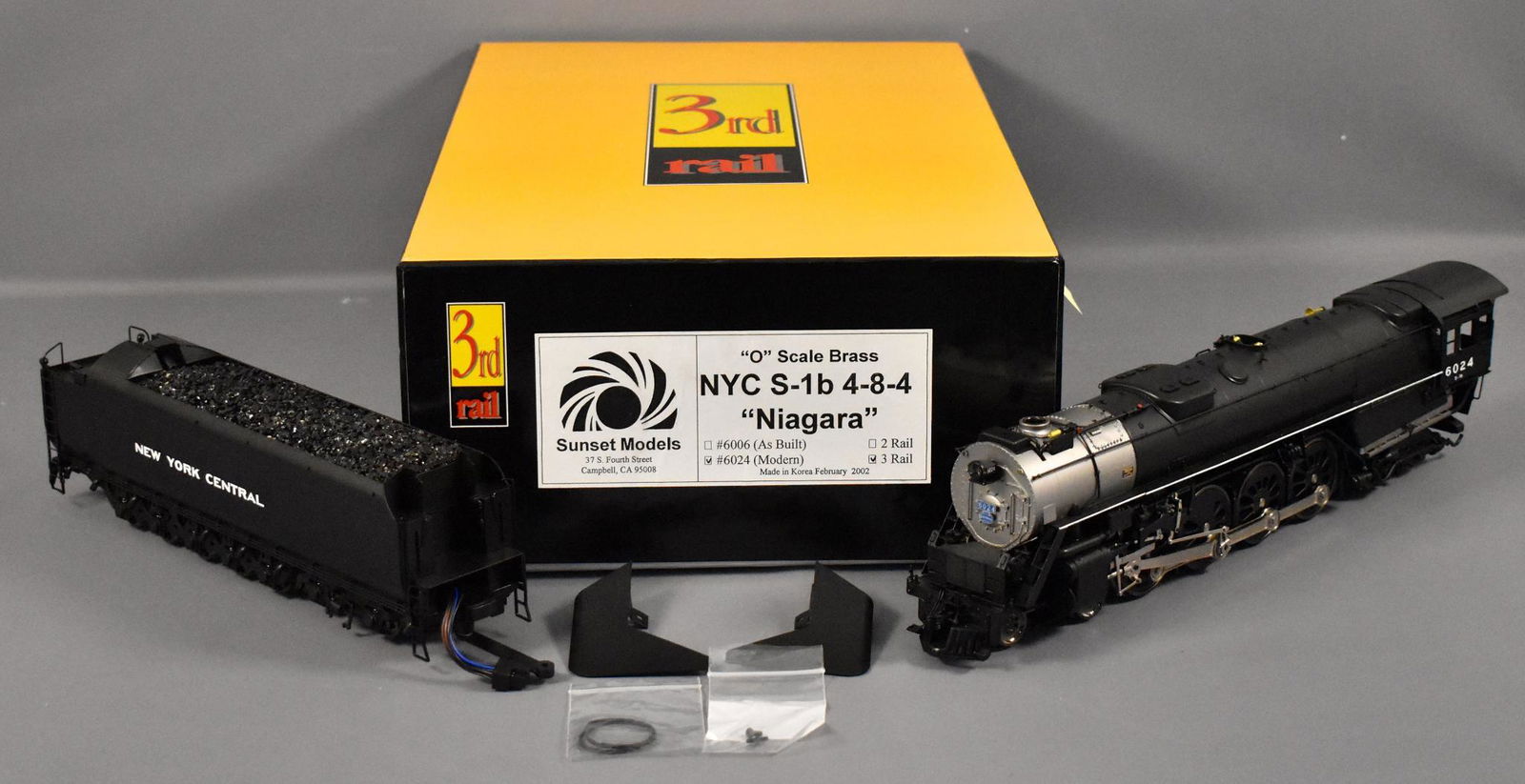 Sunset 3rd rail O scale 3 rail brass NYC S-1b 4-8-4: Sunset 3rd rail O scale 3 rail brass NYC S-1b 4-8-4 Northern "Niagara" in original box, #6024 Modern, unrun and C9-10 in a near mint original box with original paperwork with unattached shield