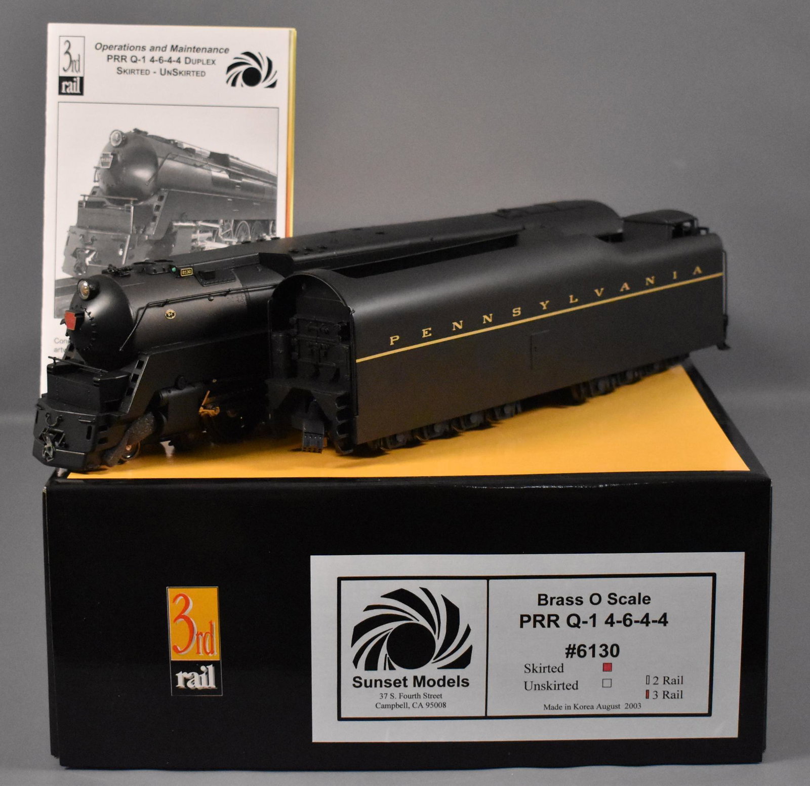 Sunset 3rd rail O scale 3 rail brass Pennsylvania Q-1: Sunset 3rd rail O scale 3 rail brass Pennsylvania Q-1 4-6-4-4 steam locomotive, cab #6130 in original box, shows light run time and is C8. Comes in a near mint original box with master carton that it 