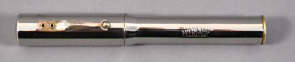 Eveready Pen Flashlight: Eveready Pen Flashlight. This pen has been used at some point and may or may not be missing internal parts as we do not have any knowledge of the internal working parts of fountain pens. It does appea
