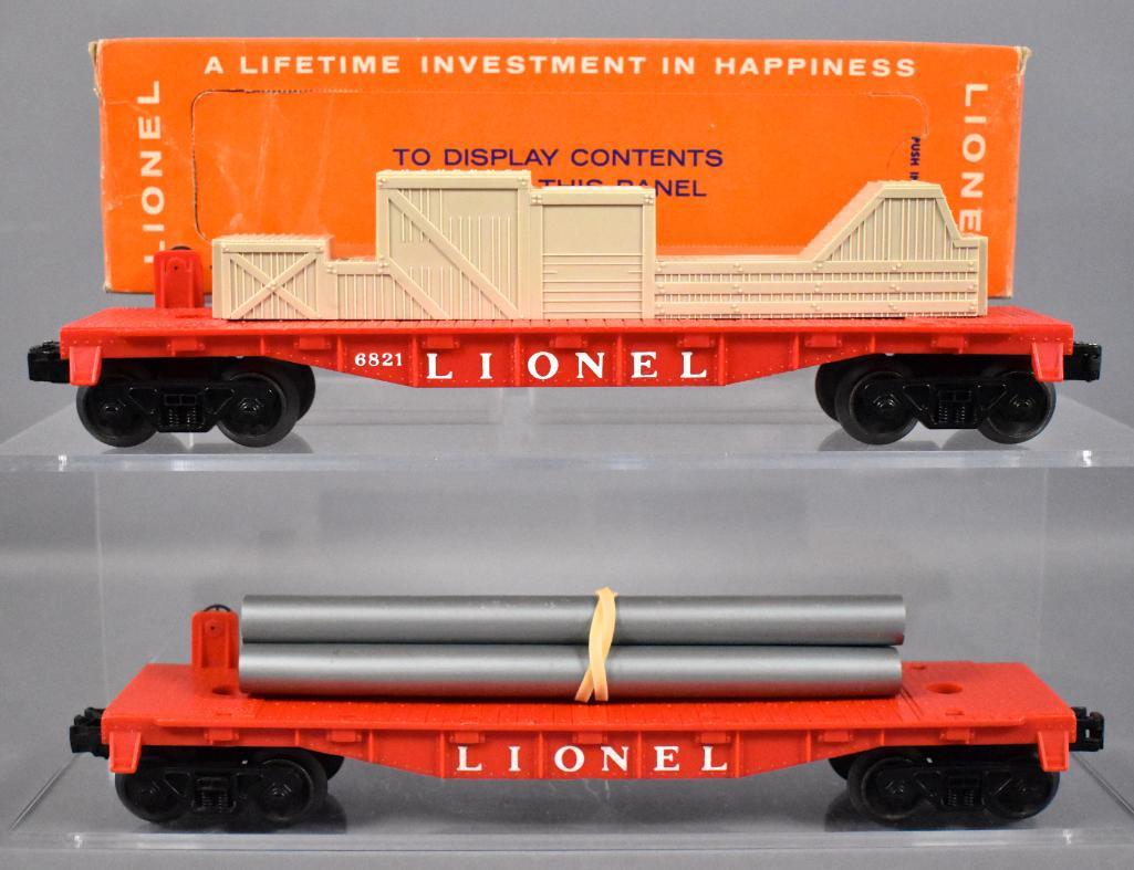 Lionel postwar O 6821 6408 flat cars with one original: Lionel postwar O 6821 and 6408 flat cars with loads and one original box, C7 with a good original box.
