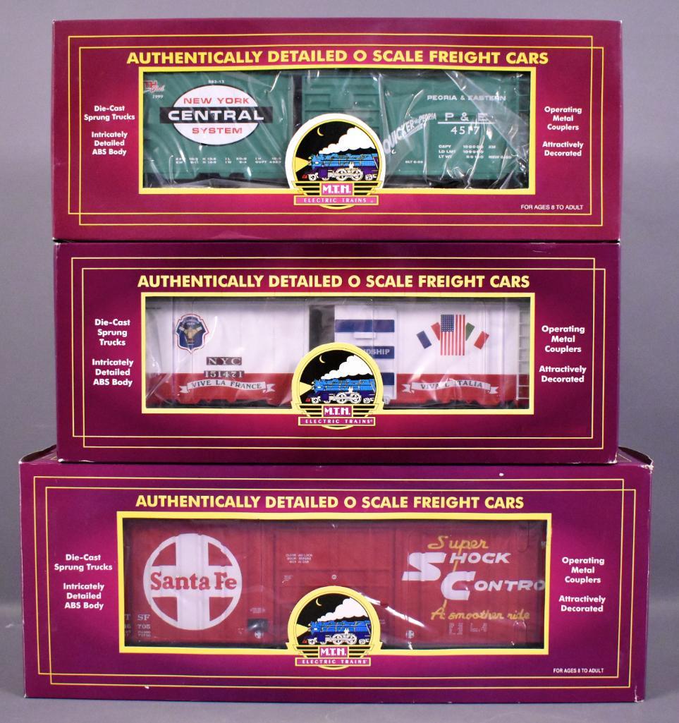 Three MTH Premier MTHRRC O gauge freight cars in (1 of 4)