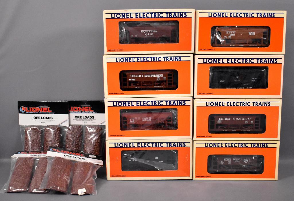 Eight Lionel modern era O ore cars with eight ore loads: Eight Lionel modern era O ore cars with eight ore loads in original boxes to include 6116 Soo Line, 6126 Canadian National, 6122 Penn Central, 6127 Northern Pacific, 19320 Pennsylvania, 19323 Detroit 