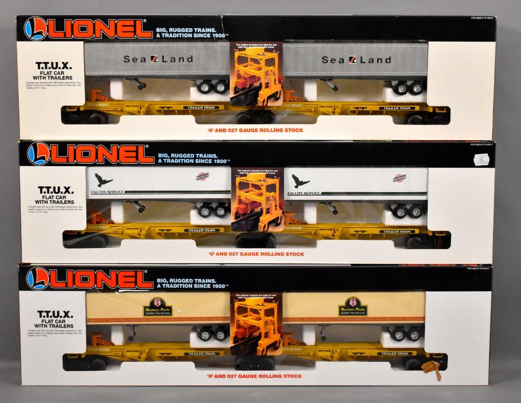 Three Lionel modern era O TTUX flat car sets in (1 of 6)