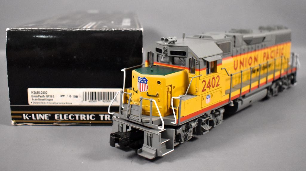 K-Line O gauge Union Pacific GP38-2 diesel locomotive: K-Line O gauge Union Pacific GP38-2 diesel locomotive in original box, stock number K2490-2402. Unit shows moderate run time and is C7-8 in a very good original box.