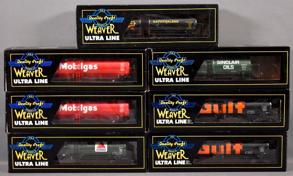 Seven Weaver O gauge 50' tank cars in original boxes: Seven Weaver O gauge 50' tank cars in original boxes to include two different road # Mobilgas, two different road # Gulf, Sunoco, Citco and Sinclair, C8-9 in very good to excellent original boxes.