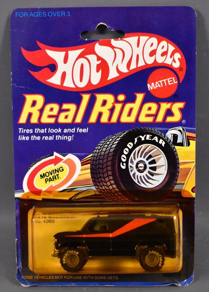 Vintage Hot Wheels Real Riders BLACK Baja Breaker on: Vintage Hot Wheels Real Riders black Baja Breaker on sealed blister card. Van is near mint to mint on a good to very good card with small crease and a slightly damaged and yellowed blister as seen in
