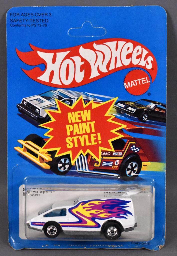 Blackwall Hot Wheels WHITE Spoiler Sport on sealed: Blackwall Hot Wheels white Spoiler Sport on sealed blister card, stock number 9641. Van is near mint to mint on a very good punched card with a clear blister that was applied somewhat sideways as seen