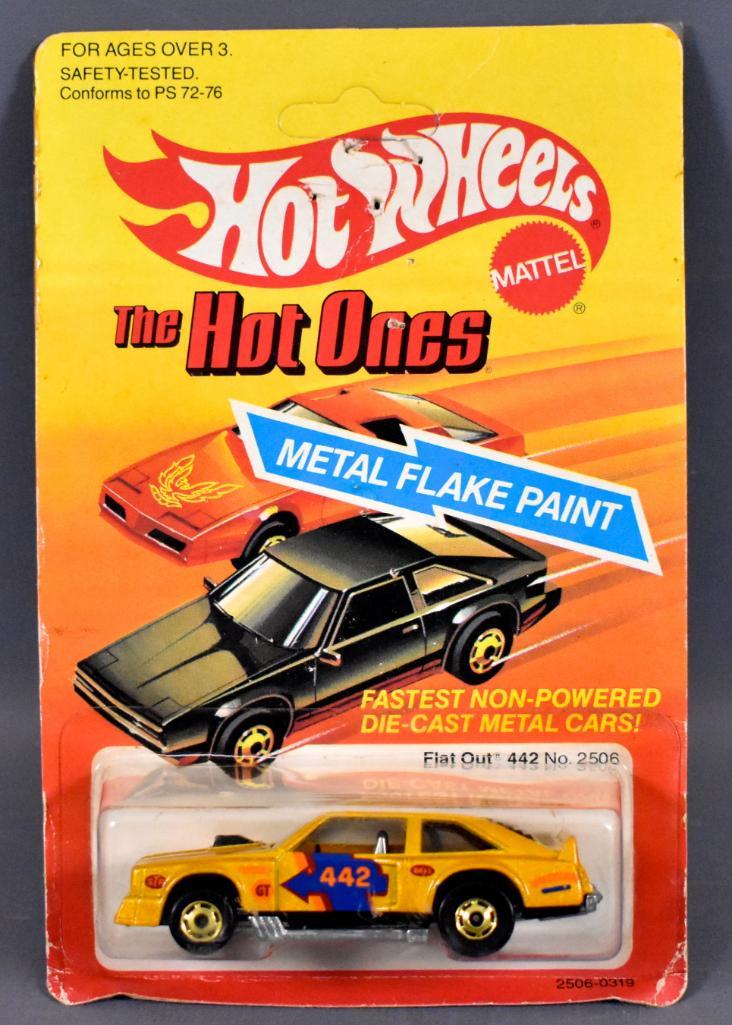 Hot Wheels Hot Ones Flat Out 442 on sealed blister card: Hot Wheels Hot Ones Flat Out 442 on sealed blister card, stock number 2506. Car is near mint to mint on a worn unpunched card with a clear but scratched blister as seen in the photos.