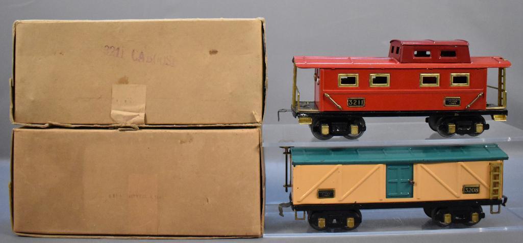 American Flyer prewar O 3208 box car and 3211 caboose: American Flyer prewar O 3208 box car and 3211 caboose in original boxes with black truck frames and tab / slot couplers, C8 in very good and excellent original boxes.