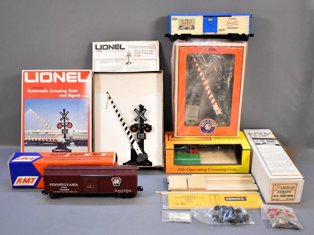 Small group of O gauge trains and accessories with four (1 of 5)