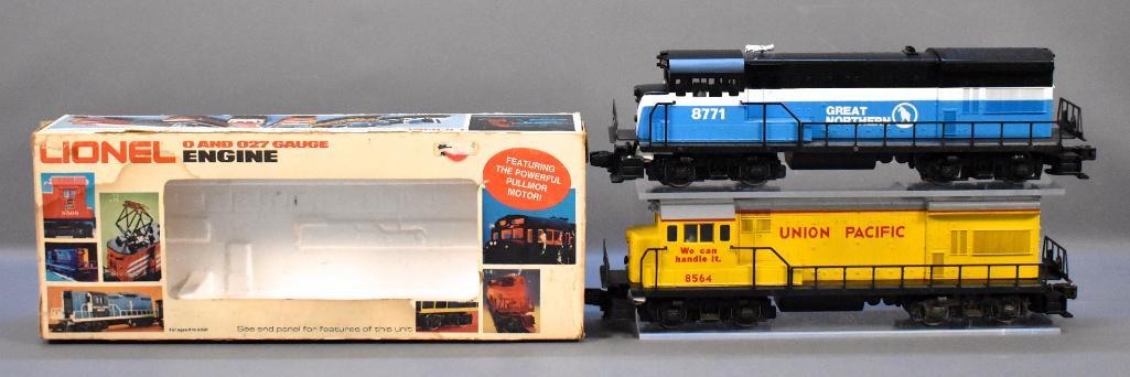 Two Lionel modern era O U-36B diesel locomotives 8564: Two Lionel modern era O U-36B diesel locomotives to include 8564 Union Pacific and 8771 Great Northern, both show heavy run time and are C6-7 with a worn original box.